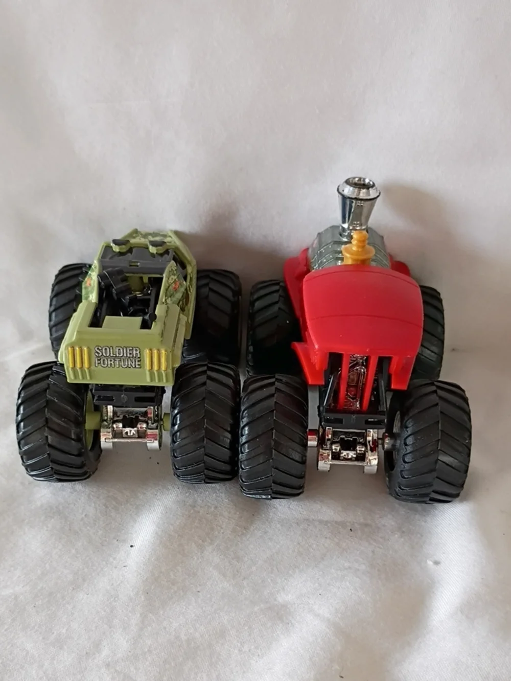 EUC Hot Wheels Monster Jam Soldier Fortune And Derailed Train Trucks Pair Of 2
